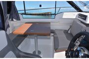 Jeanneau Merry Fisher 695 wheelhouse boat - co-pilot seat converts to seating at table Jeanneau Merry Fisher 695 - Series 2