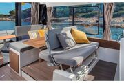 Jeanneau Merry Fisher 1095 Flybridge - co-pilot seat converts to seating at saloon table Jeanneau Merry Fisher 1095 Flybridge